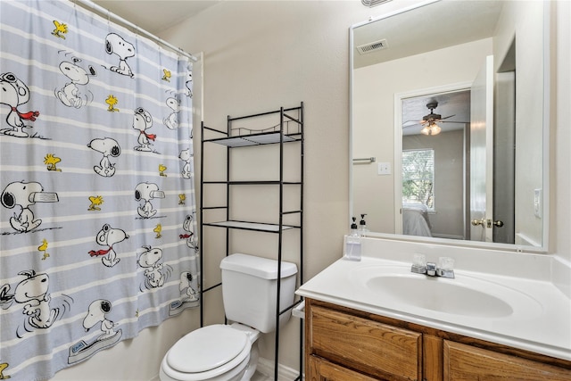 20507 Avery Grove Ct, Cypress, TX 77433 - ensuite bathroom with vanity, toilet, a ceiling fan, and shower / bath combination with curtain
