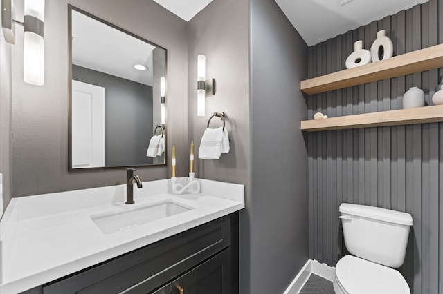 1941 Johanna Dr, Houston, TX 77055 - half bathroom featuring toilet, vanity, and baseboards