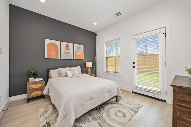 1941 Johanna Dr, Houston, TX 77055 - bedroom with access to outside, light wood-type flooring, recessed lighting, and baseboards