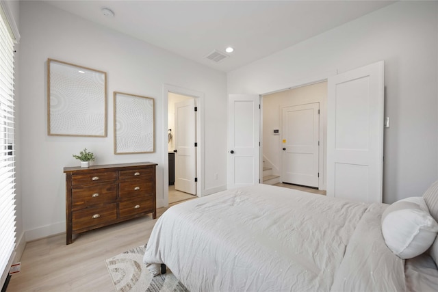 1941 Johanna Dr, Houston, TX 77055 - bedroom featuring light wood finished floors, baseboards, and recessed lighting