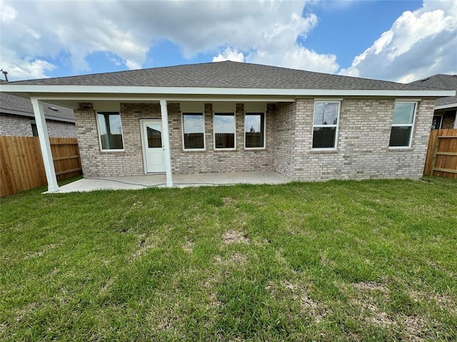 10623 Autumn Trace Dr, Beasley, TX 77417 - back of house with a patio area and brick siding