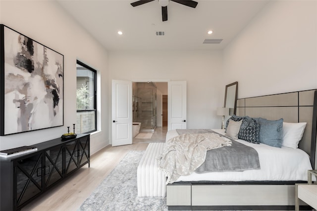 5008 Holt St, Bellaire, TX 77401 - bedroom featuring light wood-style floors, recessed lighting, and ceiling fan