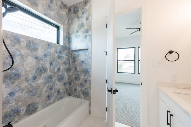 5008 Holt St, Bellaire, TX 77401 - bathroom featuring healthy amount of natural light, washtub / shower combination, and vanity