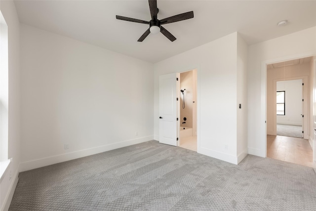 5008 Holt St, Bellaire, TX 77401 - empty room with attic access, carpet, a ceiling fan, and baseboards