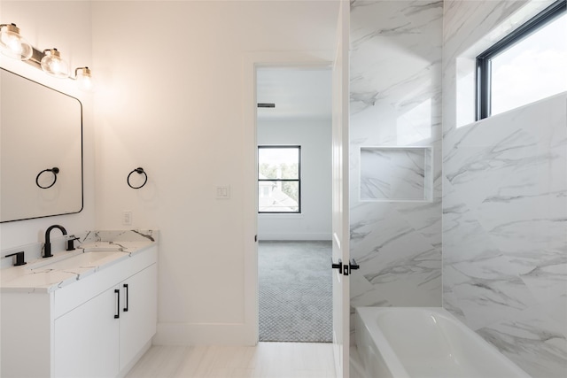5008 Holt St, Bellaire, TX 77401 - full bath featuring vanity, baseboards, and shower / tub combination