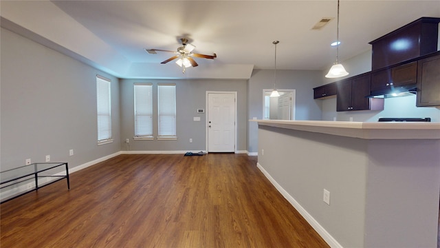 2405 Dolly Wright St, Houston, TX 77088 - kitchen featuring a ceiling fan, dark wood-type flooring, baseboards, and decorative light fixtures