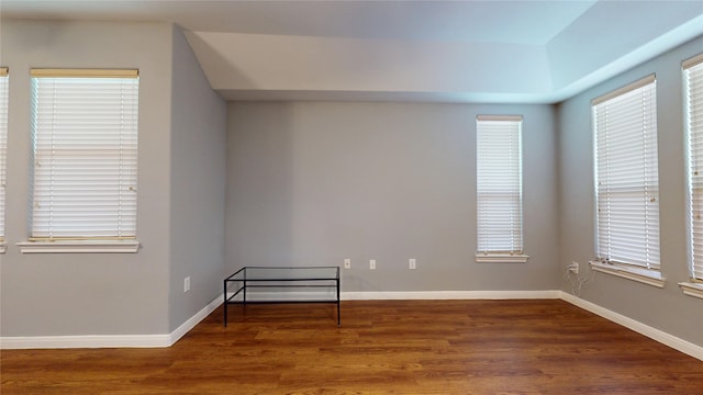 2405 Dolly Wright St, Houston, TX 77088 - empty room featuring wood finished floors, healthy amount of natural light, and baseboards