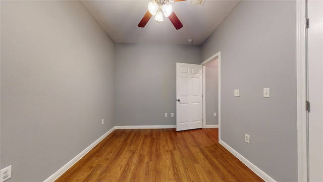 2405 Dolly Wright St, Houston, TX 77088 - unfurnished room with wood finished floors, a ceiling fan, and baseboards