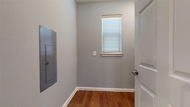 2405 Dolly Wright St, Houston, TX 77088 - corridor with electric panel, baseboards, and wood finished floors