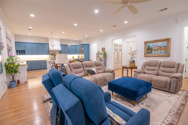 10614 Moonlight Dr, Houston, TX 77096 - living area with light wood-style flooring, recessed lighting, and ceiling fan