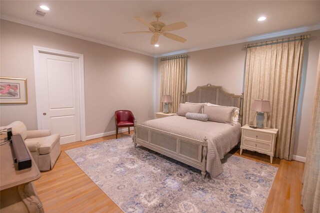 10614 Moonlight Dr, Houston, TX 77096 - bedroom featuring wood finished floors, recessed lighting, crown molding, baseboards, and a ceiling fan