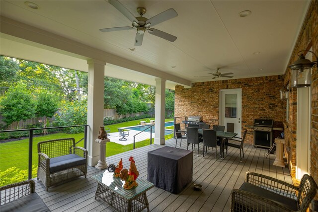 10614 Moonlight Dr, Houston, TX 77096 - wooden terrace with ceiling fan, outdoor dining space, and a grill