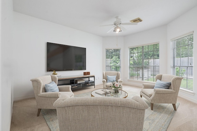 18107 Hampton Oak Dr, Spring, TX 77379 - living room with light carpet, plenty of natural light, and ceiling fan
