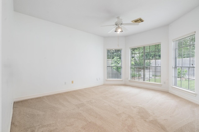 18107 Hampton Oak Dr, Spring, TX 77379 - carpeted empty room featuring healthy amount of natural light and a ceiling fan