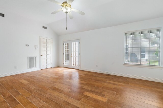 18107 Hampton Oak Dr, Spring, TX 77379 - empty room featuring light wood finished floors, vaulted ceiling, and ceiling fan