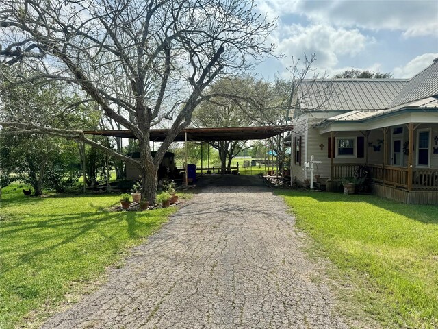 706 W St, Yoakum, TX 77995 - view of asphalt driveway