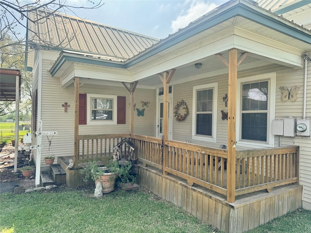 706 W St, Yoakum, TX 77995 - view of front of home featuring covered porch and metal roof