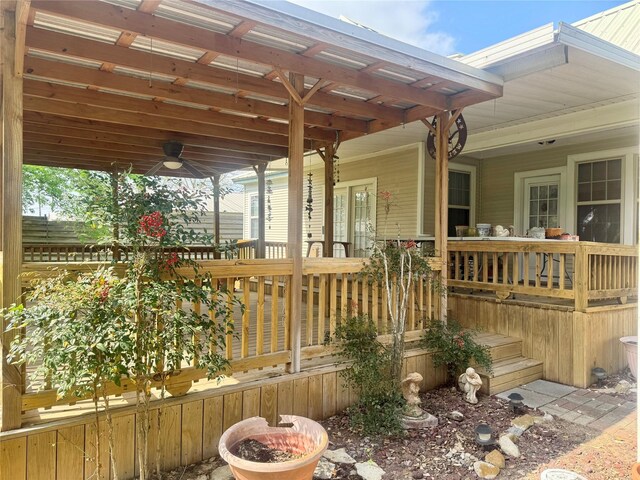 706 W St, Yoakum, TX 77995 - wooden deck with ceiling fan