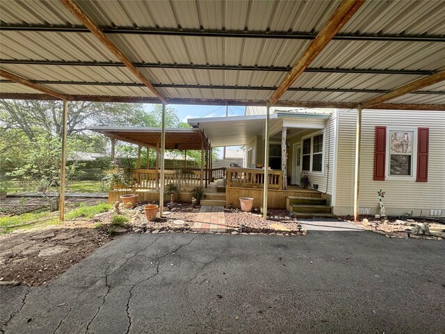 706 W St, Yoakum, TX 77995 - porch featuring a carport