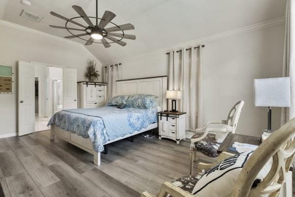 23706 River Place Dr, Katy, TX 77494 - bedroom featuring ornamental molding, wood finished floors, lofted ceiling, and ceiling fan