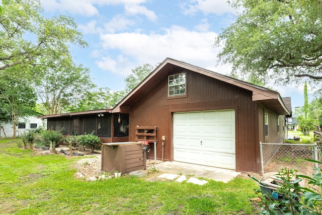 6915 Oak Bend Dr, Alvin, TX 77511 - back of house with a sunroom