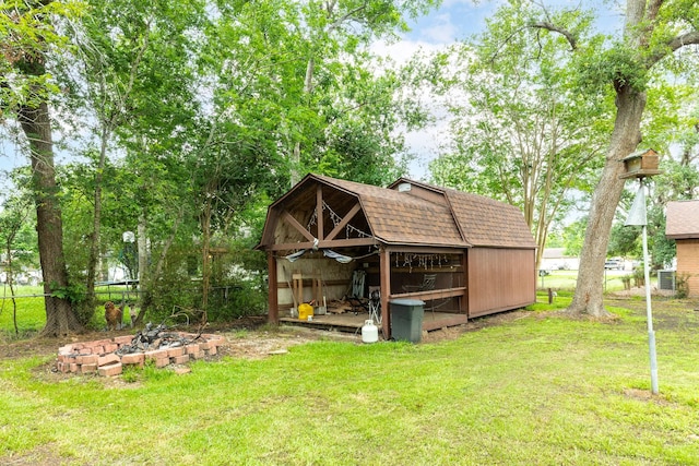 6915 Oak Bend Dr, Alvin, TX 77511 - view of yard featuring an outdoor structure and cooling unit