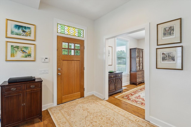 523 W 15th St, Houston, TX 77008 - entrance foyer with light wood-style floors and plenty of natural light