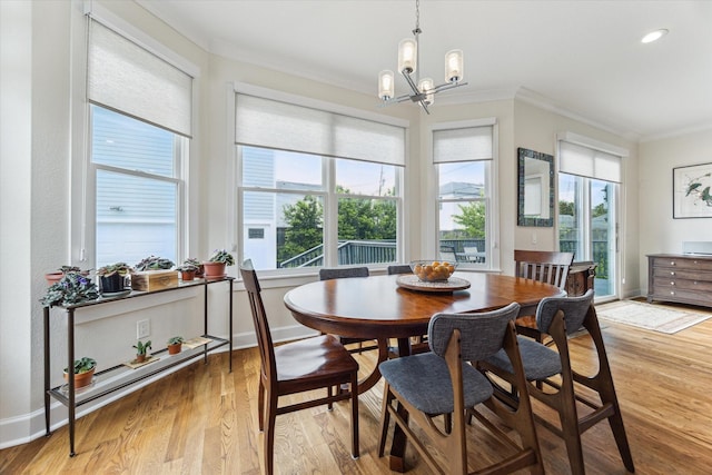523 W 15th St, Houston, TX 77008 - dining room with crown molding, a chandelier, plenty of natural light, light wood-style floors, and recessed lighting