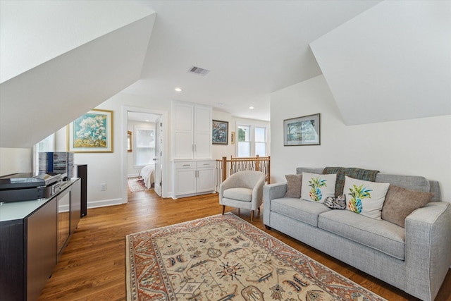 523 W 15th St, Houston, TX 77008 - living room with light wood-style flooring, vaulted ceiling, and recessed lighting