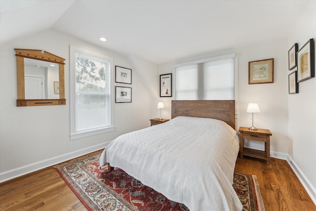523 W 15th St, Houston, TX 77008 - bedroom featuring lofted ceiling and wood finished floors