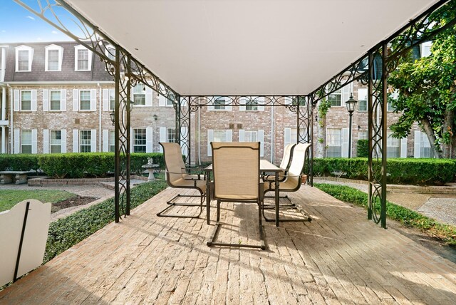 355 N Post Oak Ln Unit 743, Houston, TX 77024 - view of patio / terrace featuring outdoor dining space