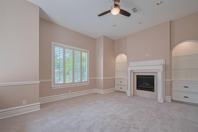 8522 Haven Trl, Tomball, TX 77375 - unfurnished living room with a ceiling fan, a tiled fireplace, light colored carpet, baseboards, and recessed lighting
