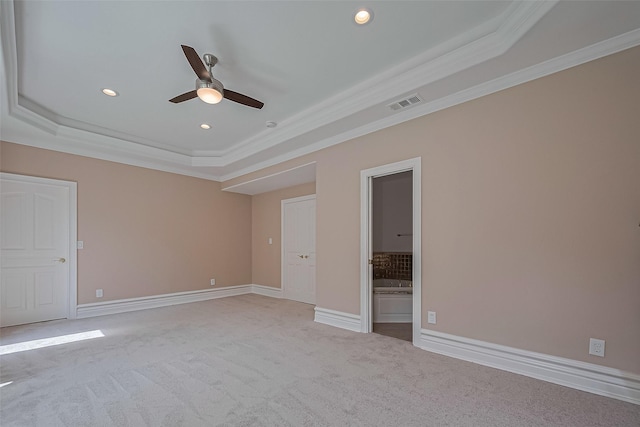 8522 Haven Trl, Tomball, TX 77375 - carpeted spare room featuring a tray ceiling, crown molding, ceiling fan, recessed lighting, and baseboards
