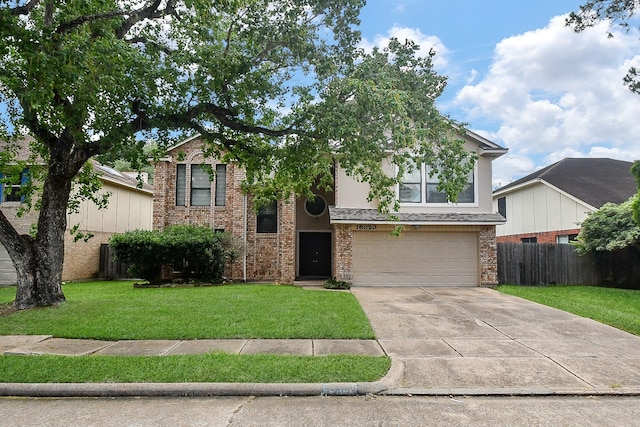 16323 Elmwood Point Ln, Sugar Land, TX 77498 - view of front of property with driveway, a garage, and brick siding