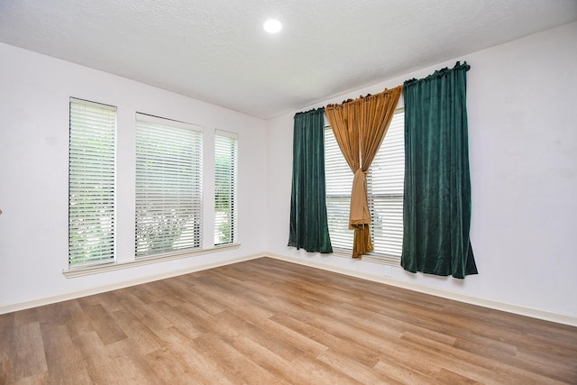 16323 Elmwood Point Ln, Sugar Land, TX 77498 - unfurnished room featuring light wood-style floors and baseboards
