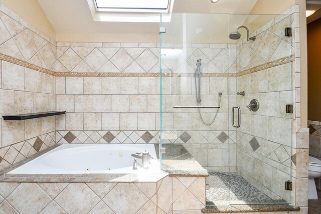 16323 Elmwood Point Ln, Sugar Land, TX 77498 - full bathroom featuring a tub with jets, a stall shower, tile walls, and toilet