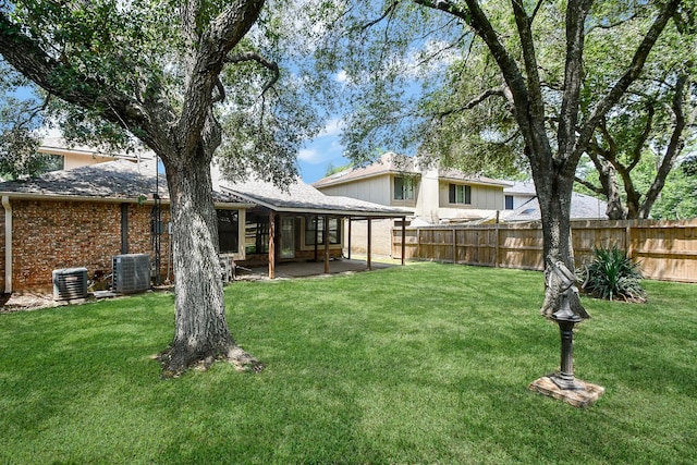 16323 Elmwood Point Ln, Sugar Land, TX 77498 - back of house featuring central air condition unit, a patio area, and brick siding