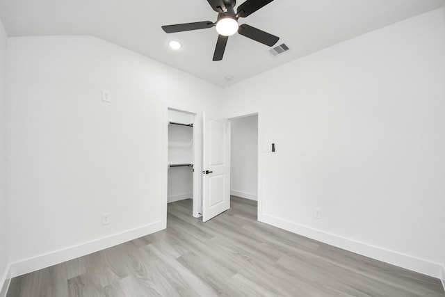 9406 Sandra St, Houston, TX 77016 - unfurnished bedroom featuring light wood-type flooring, a ceiling fan, a spacious closet, a closet, and recessed lighting