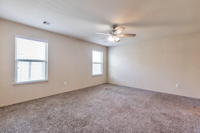 16531 Silla Ridge Ct, Houston, TX 77049 - empty room featuring a ceiling fan, carpet flooring, and baseboards