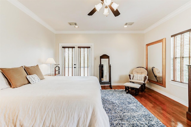 1529 Rosewood St, Houston, TX 77004 - bedroom featuring multiple windows, access to exterior, wood finished floors, and ornamental molding