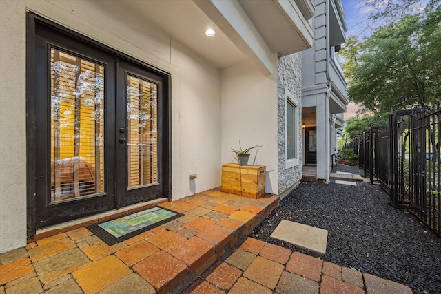 1529 Rosewood St, Houston, TX 77004 - view of exterior entry with stucco siding and french doors