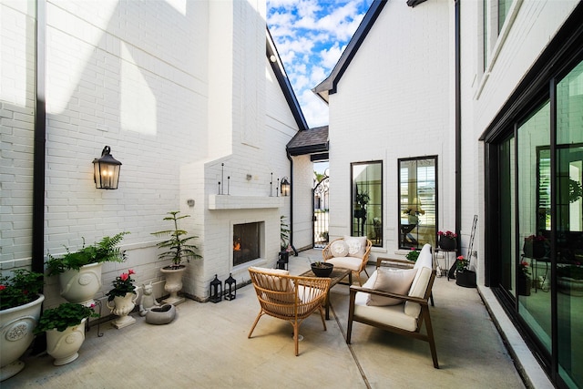 11303 Flying Admiral Dr, Cypress, TX 77433 - view of patio / terrace featuring an outdoor living space with a fireplace