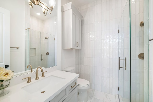 11303 Flying Admiral Dr, Cypress, TX 77433 - bathroom featuring vanity, toilet, a shower stall, a chandelier, and marble finish flooring