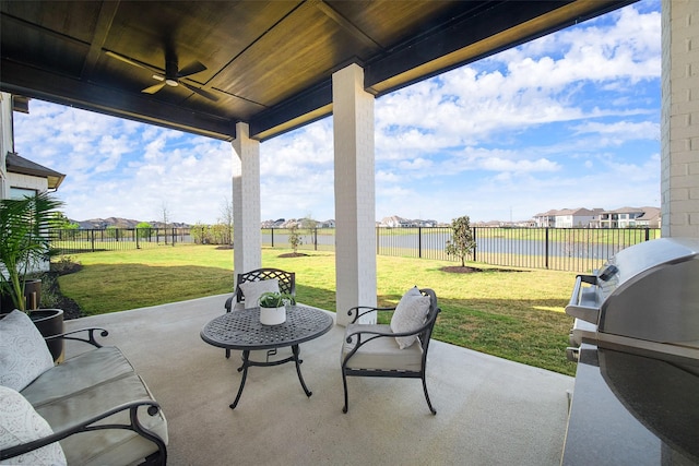11303 Flying Admiral Dr, Cypress, TX 77433 - view of patio with a water view, a ceiling fan, and a residential view