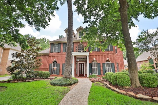 6914 Kelsey Rae Ct, Houston, TX 77069 - colonial inspired home with brick siding and a front yard
