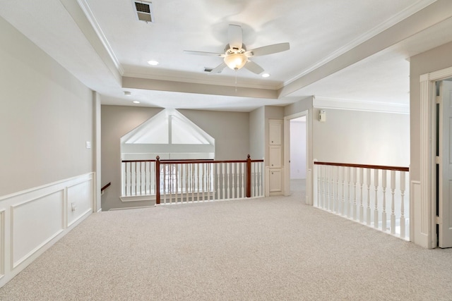 6914 Kelsey Rae Ct, Houston, TX 77069 - carpeted empty room with ornamental molding, ceiling fan, a tray ceiling, wainscoting, and recessed lighting