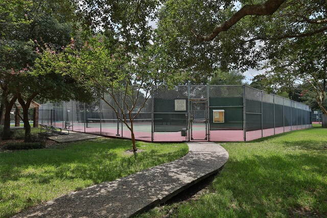 6914 Kelsey Rae Ct, Houston, TX 77069 - view of tennis court with a gate