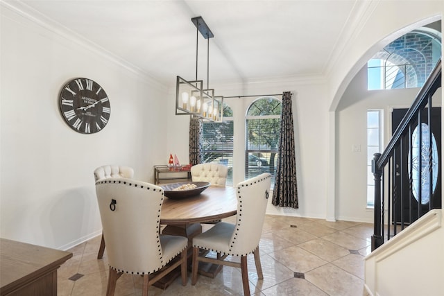 14 Carmel Chase Ct, Manvel, TX 77578 - dining space with light tile patterned floors, plenty of natural light, crown molding, arched walkways, and stairway