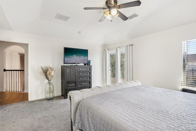14 Carmel Chase Ct, Manvel, TX 77578 - carpeted bedroom featuring arched walkways, a ceiling fan, and baseboards