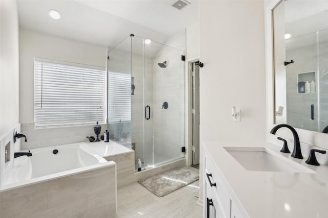 14 Carmel Chase Ct, Manvel, TX 77578 - full bath featuring vanity, a bath, a stall shower, recessed lighting, and tile patterned floors